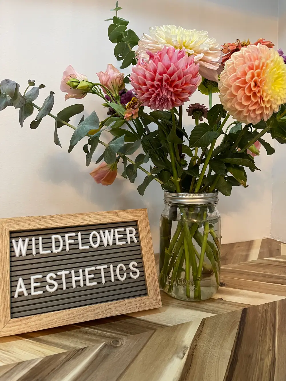Fresh flowers and the Wildflower Aesthetics letter board